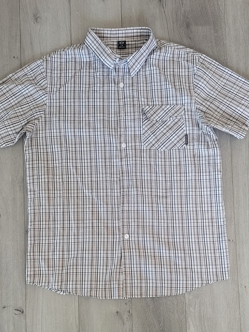 Oakley White and Black Plaid Short Sleeve Button-Down Shirt